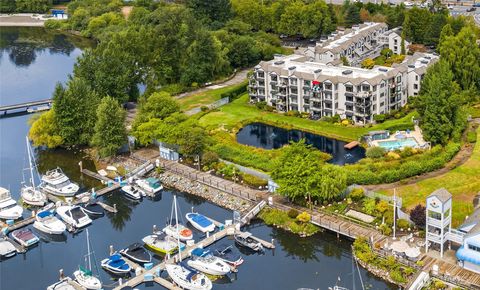 Photo of 6121 NE 175th Street #C203, Kenmore, WA 98028 (MLS # 2442972)