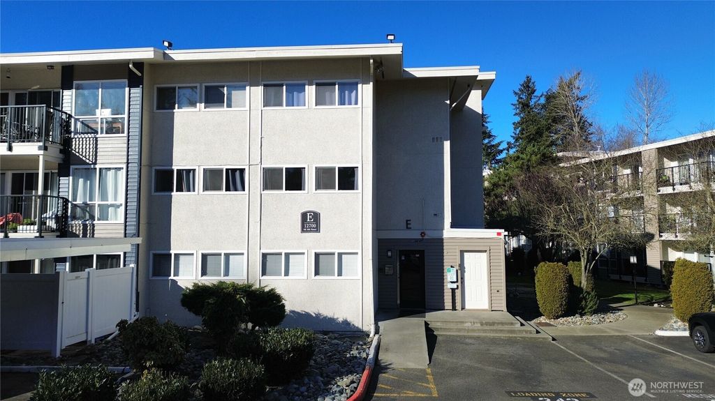 Photo of 12700 NE 8th Street #E203, Bellevue, WA 98005 (MLS # 2386652)