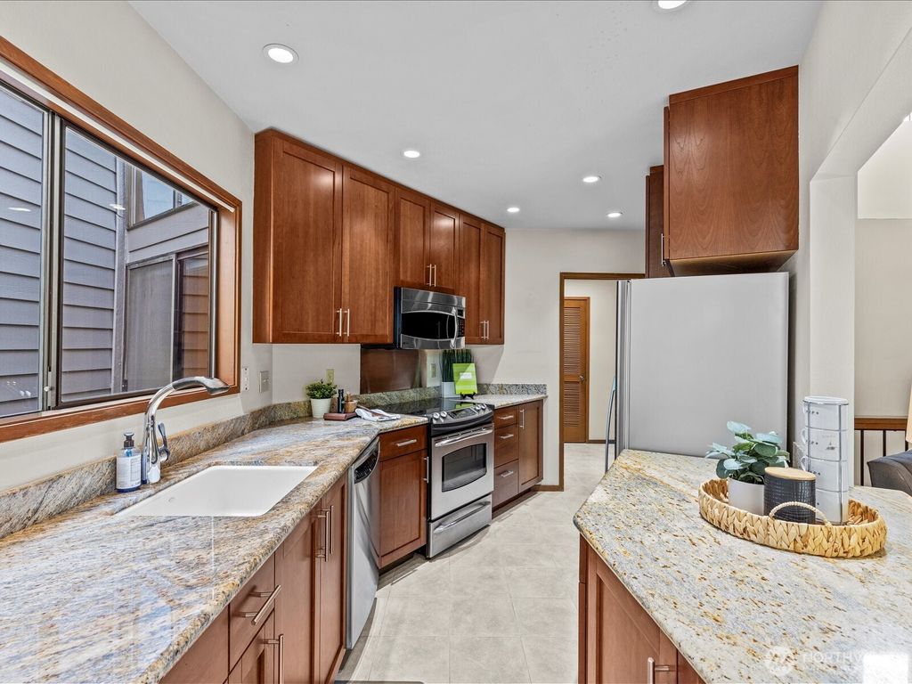 Photo of 15000 Village Green Drive #19, Mill Creek, WA 98012 (MLS # 2420187)