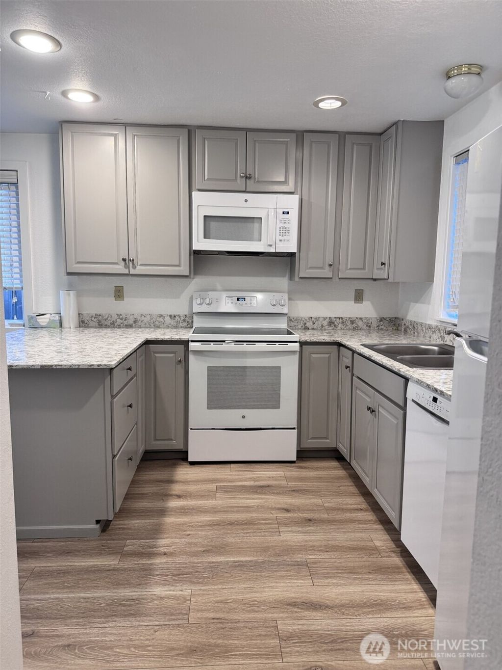 Photo of 12722 12724 100th Avenue NE, Kirkland, WA 98034 (MLS # 2468175)