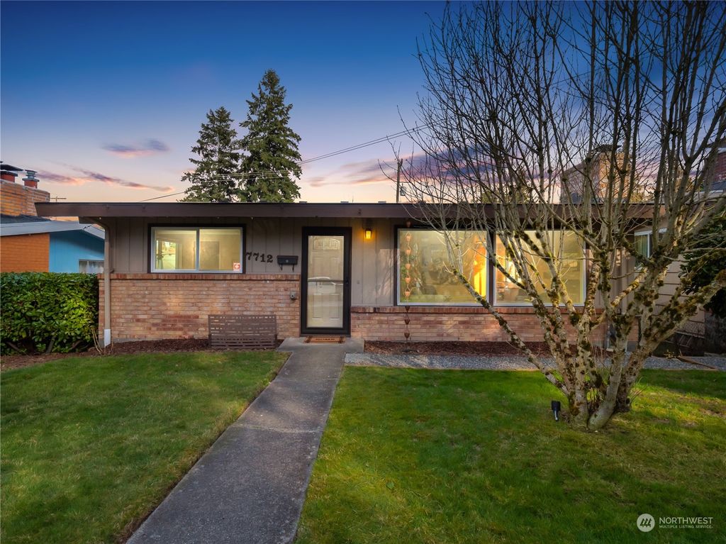 Photo of 7712 18th Avenue SW, Seattle, WA 98106 (MLS # 2043401)