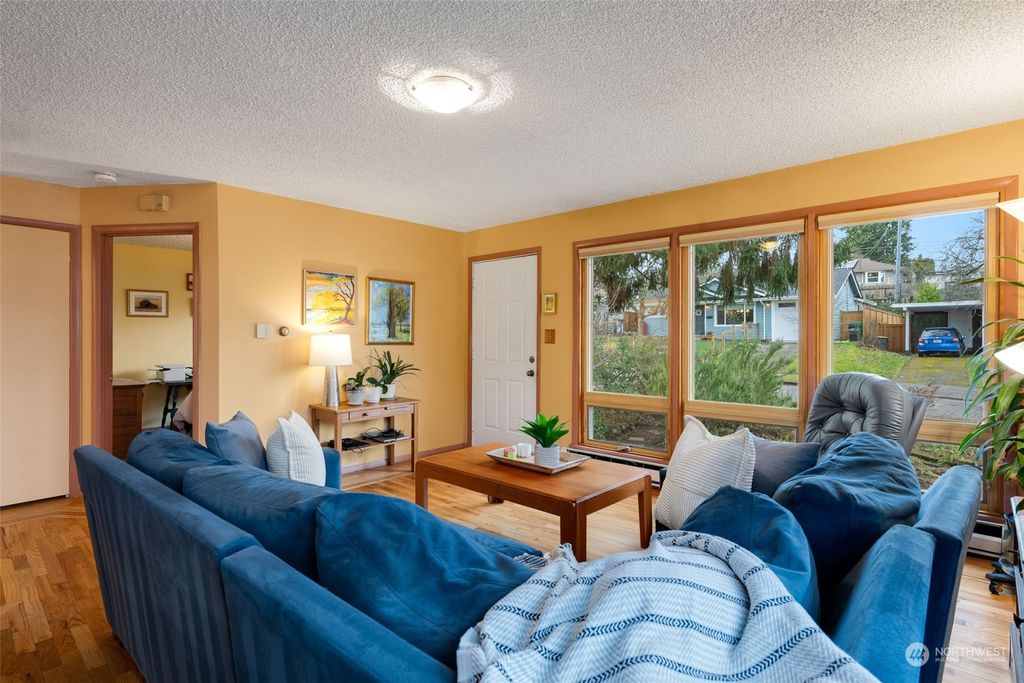 Photo of 9334 32nd Avenue SW, Seattle, WA 98126 (MLS # 2326525)