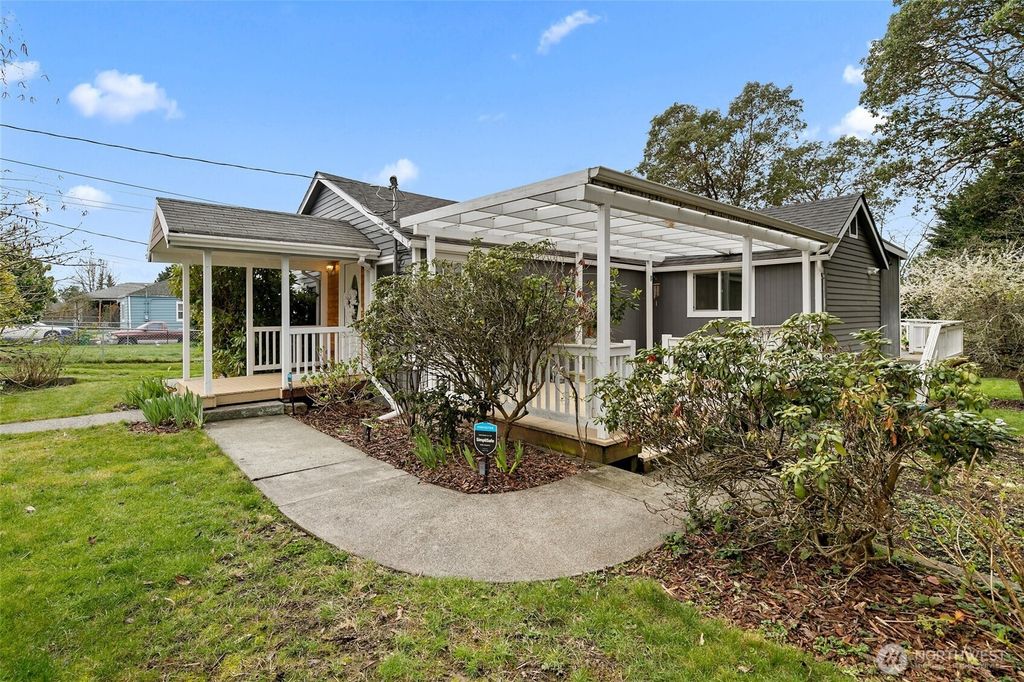 Photo of 10717 19th Avenue SW, Seattle, WA 98146 (MLS # 2351418)