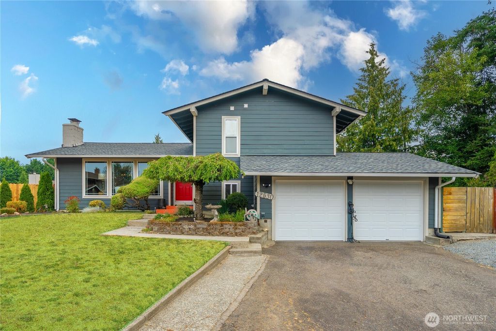 Photo of 12530 SE 212th Place, Kent, WA 98031 (MLS # 2418173)