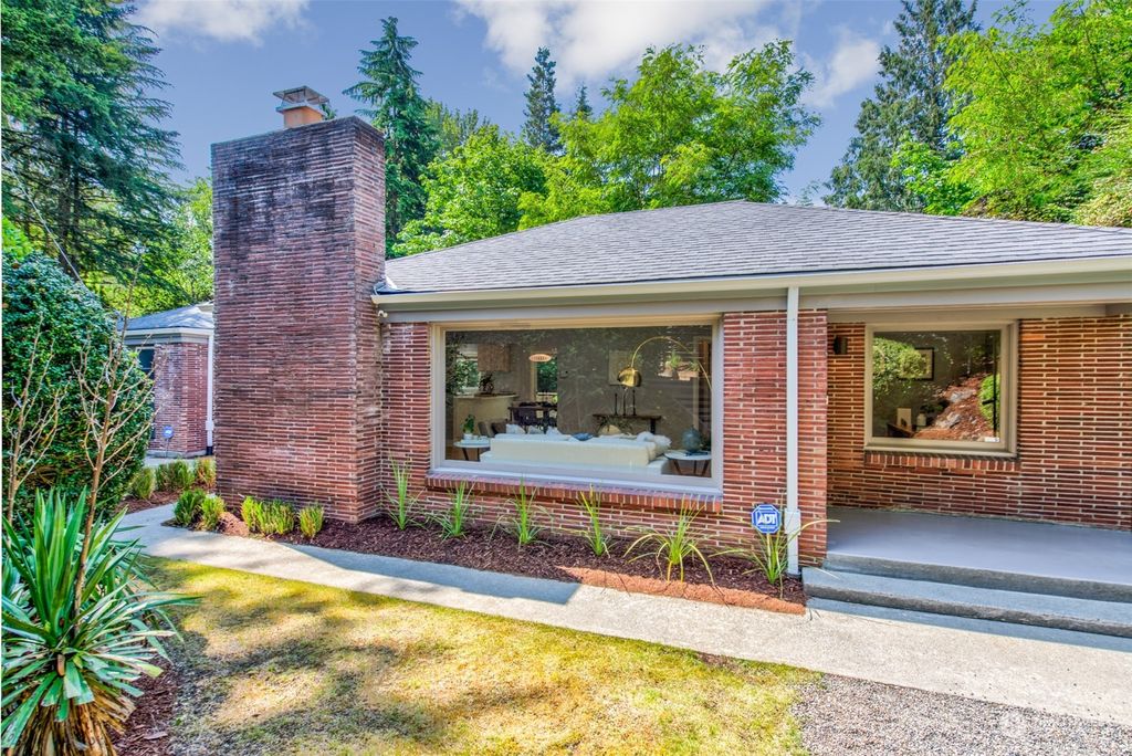 Photo of 11825 31st Place NE, Seattle, WA 98125 (MLS # 2131132)
