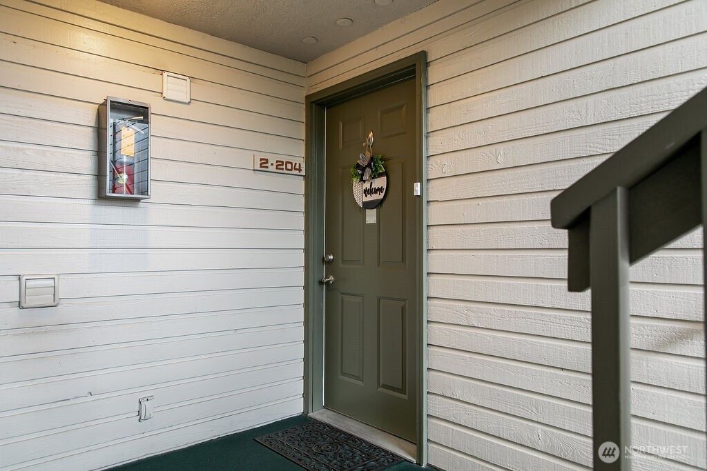 Photo of 20050 Vikings Crest Loop NE #2-204, Poulsbo, WA 98370 (MLS # 2506686)