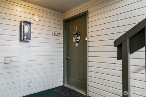 Photo of 20050 Vikings Crest Loop NE #2-204, Poulsbo, WA 98370 (MLS # 2506686)
