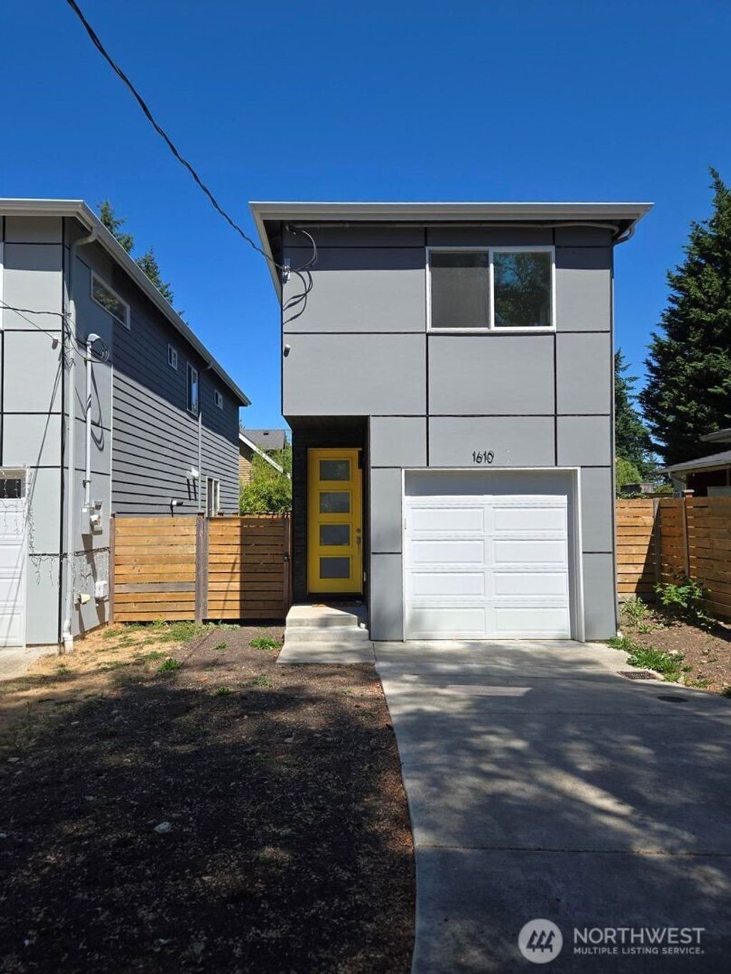 Photo of 1610 N 143rd Street, Seattle, WA 98133 (MLS # 2416235)
