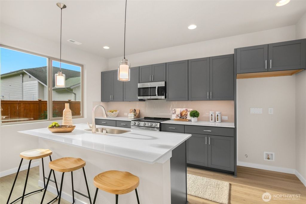 Photo of 12429 SE 256th Place #3, Kent, WA 98030 (MLS # 2398295)