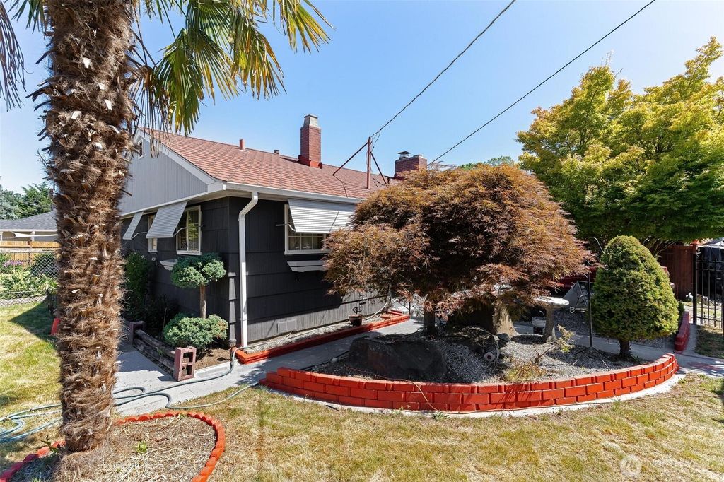 Photo of 4504 S Trenton Street, Seattle, WA 98118 (MLS # 2402972)