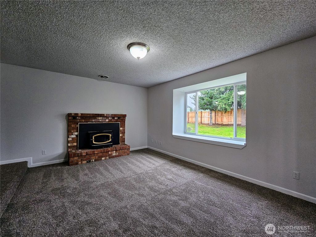 Photo of 21707 49th Avenue Ct E, Spanaway, WA 98387 (MLS # 2477319)