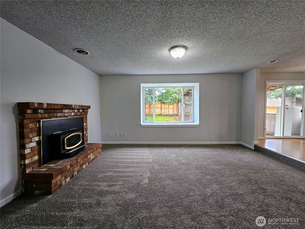 Photo of 21707 49th Avenue Ct E, Spanaway, WA 98387 (MLS # 2477319)