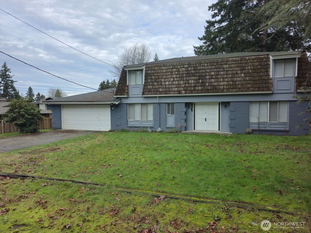 Photo of 12209 12th Drive SE, Everett, WA 98208 (MLS # 2472123)