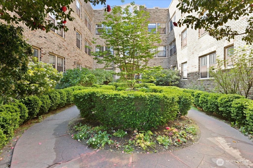 Photo of 1605 E Olive Street #105, Seattle, WA 98122 (MLS # 2374514)