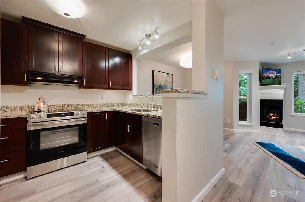 Photo of 5000 NW Village Park Drive #B-111, Issaquah, WA 98027 (MLS # 2142185)