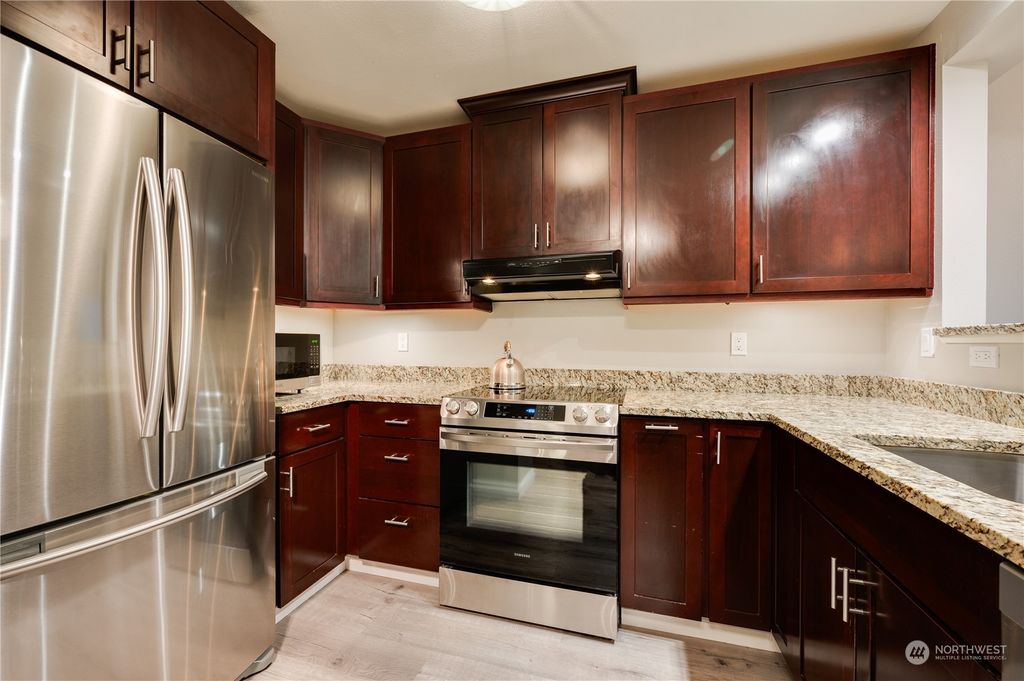 Photo of 5000 NW Village Park Drive #B-111, Issaquah, WA 98027 (MLS # 2142185)