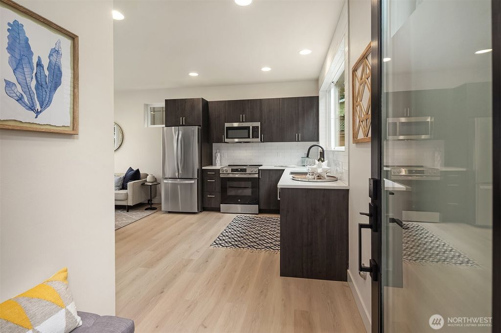 Photo of 8823 Ashworth Avenue N #B, Seattle, WA 98103 (MLS # 2459576)