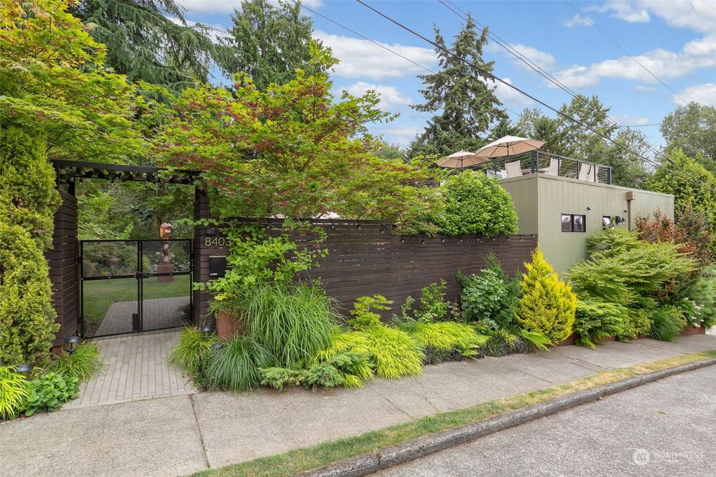 Photo of 8403 Island Drive S, Seattle, WA 98118 (MLS # 2270236)
