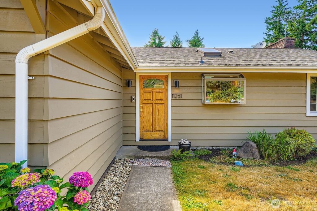 Photo of 11251 28th Avenue SW, Seattle, WA 98146 (MLS # 2395233)