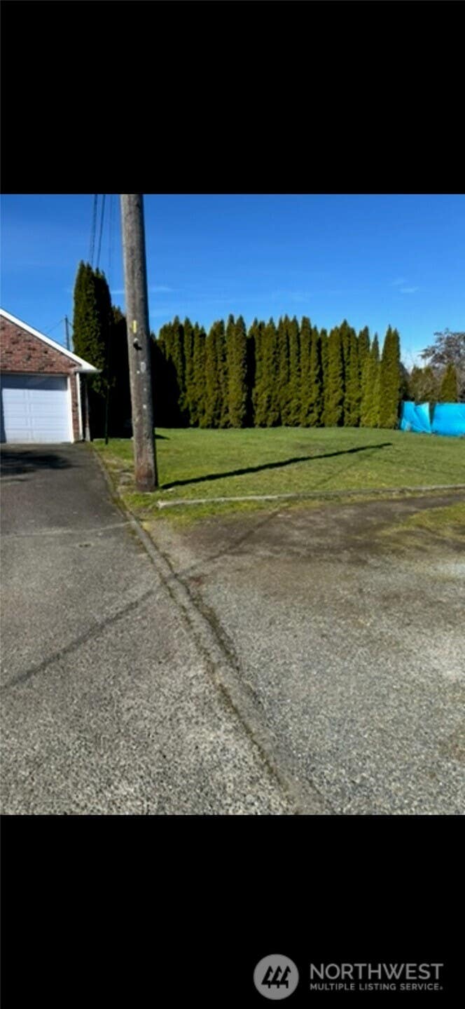 Photo of 5821 S Sheridan Avenue, Tacoma, WA 98408 (MLS # 2553311)