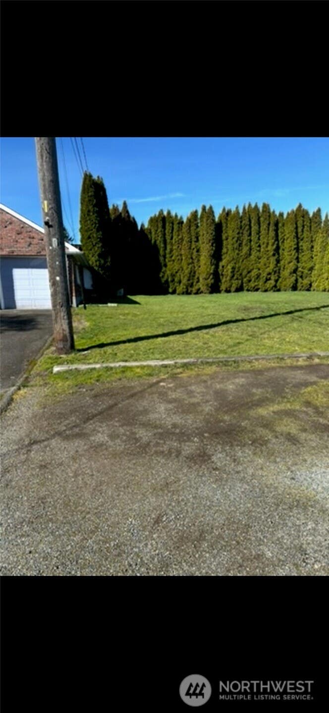 Photo of 5821 S Sheridan Avenue, Tacoma, WA 98408 (MLS # 2553311)