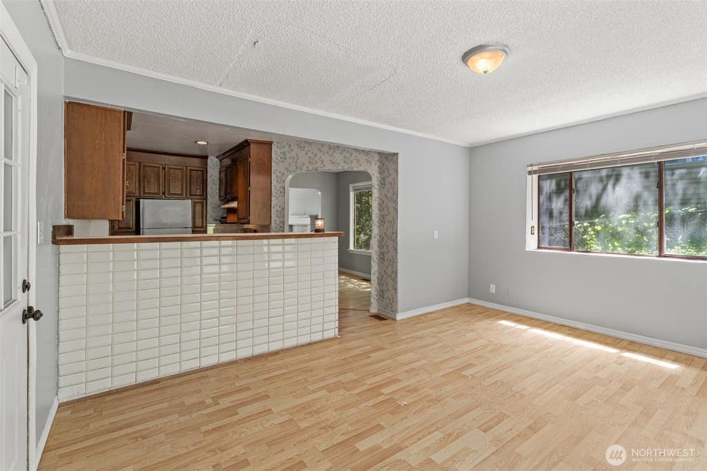 Photo of 9059 Carkeek Drive S, Seattle, WA 98118 (MLS # 2535322)