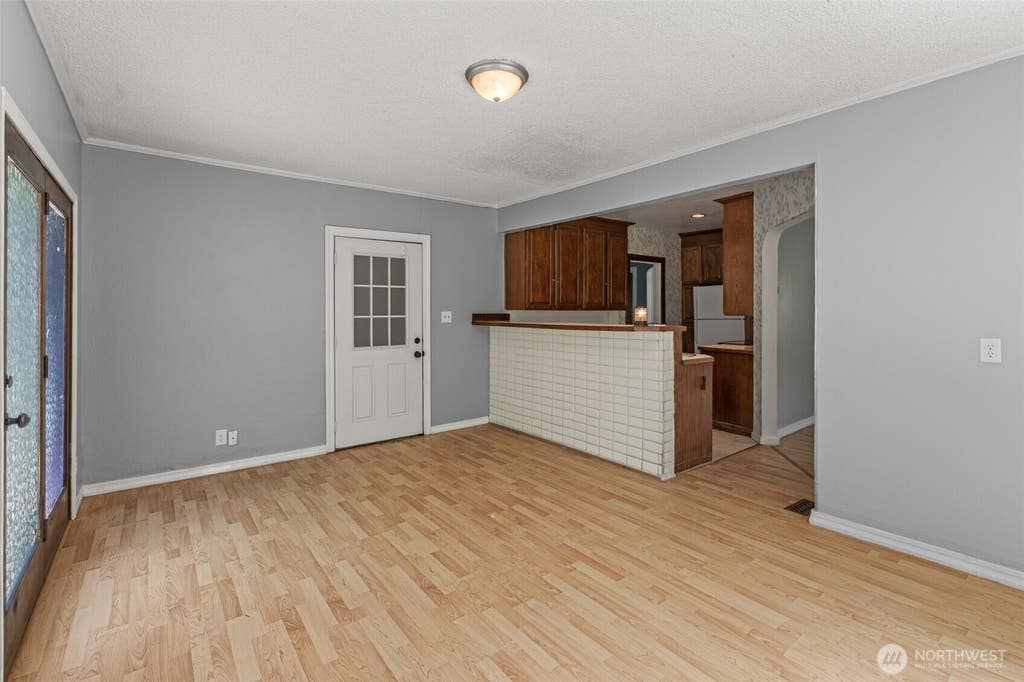 Photo of 9059 Carkeek Drive S, Seattle, WA 98118 (MLS # 2535322)