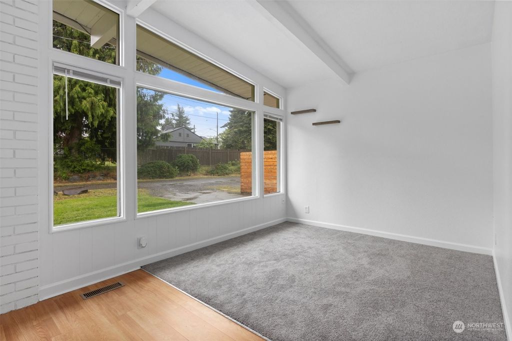 Photo of 12021 64th Avenue S, Seattle, WA 98178 (MLS # 2245497)