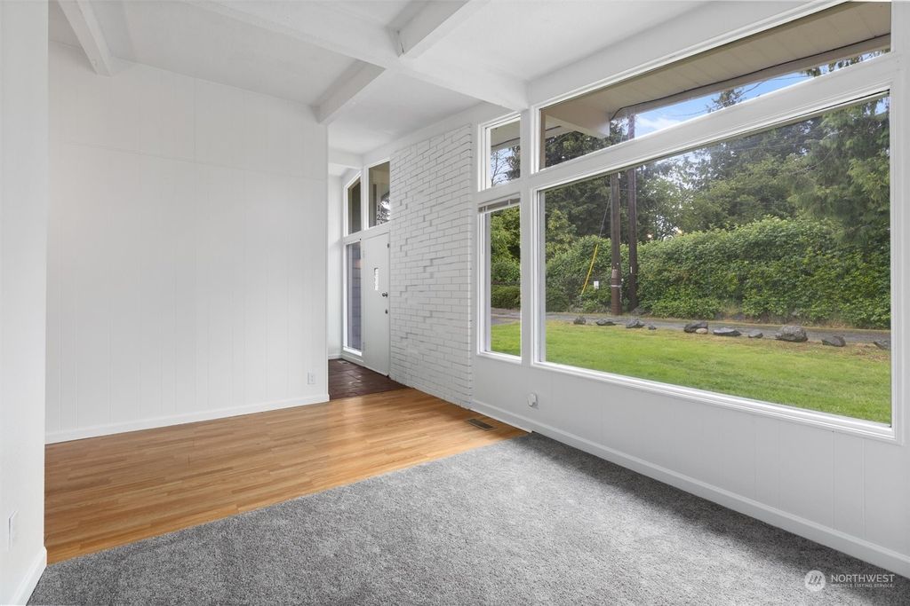 Photo of 12021 64th Avenue S, Seattle, WA 98178 (MLS # 2245497)