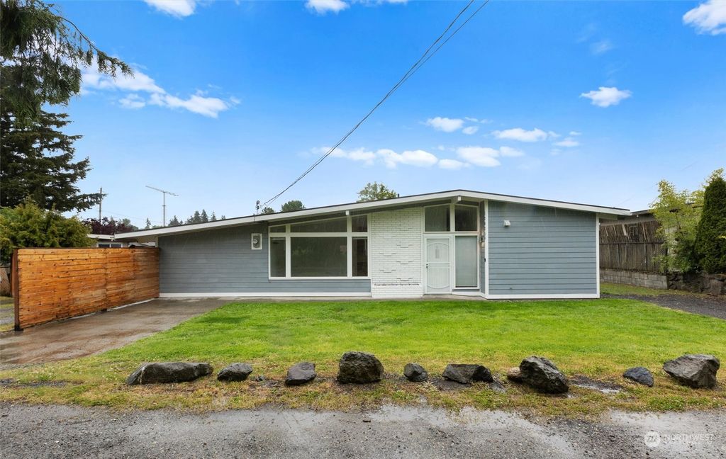 Photo of 12021 64th Avenue S, Seattle, WA 98178 (MLS # 2245497)