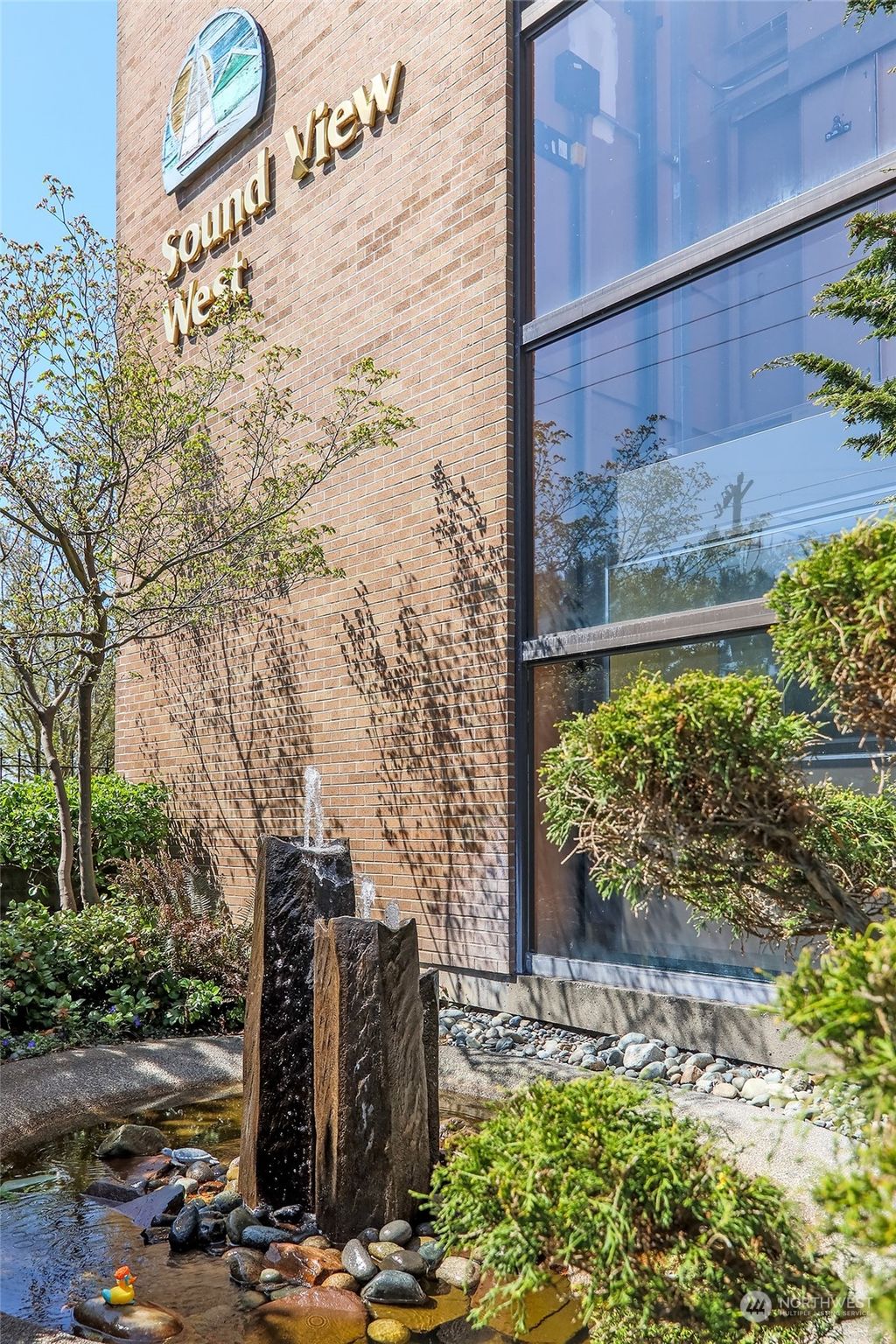 Photo of 9023 Mary Avenue NW #101, Seattle, WA 98117 (MLS # 2063763)