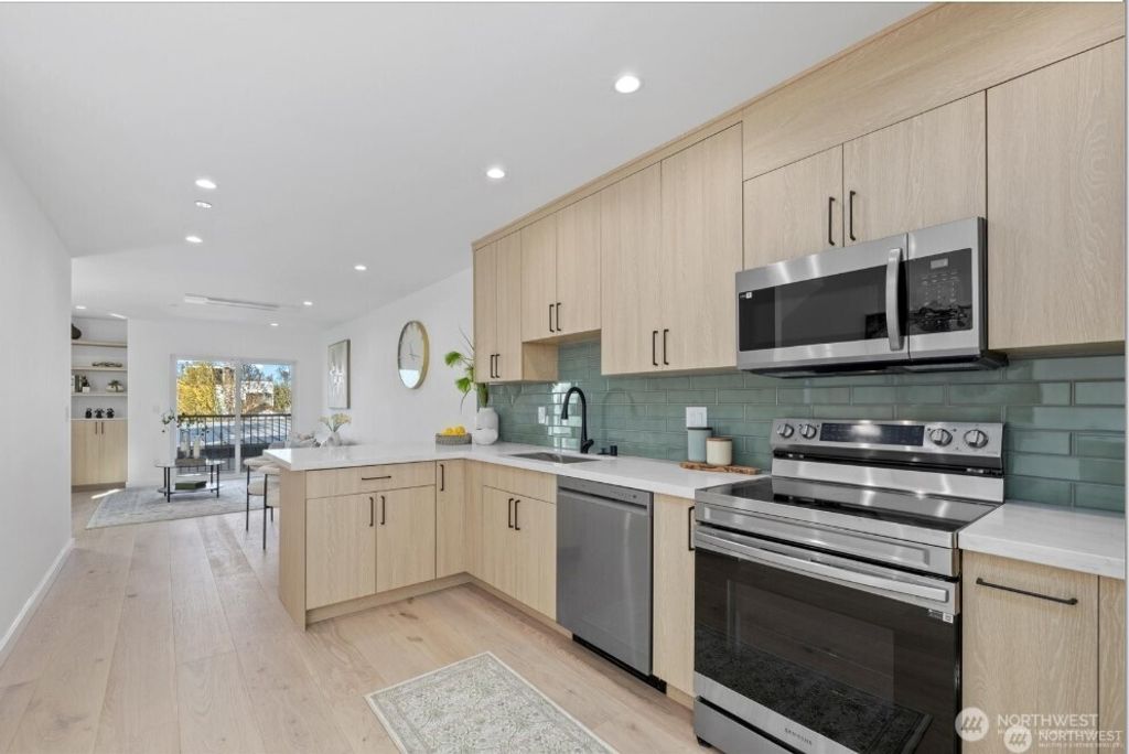 Photo of 6032 42nd Avenue SW #B, Seattle, WA 98136 (MLS # 2405578)