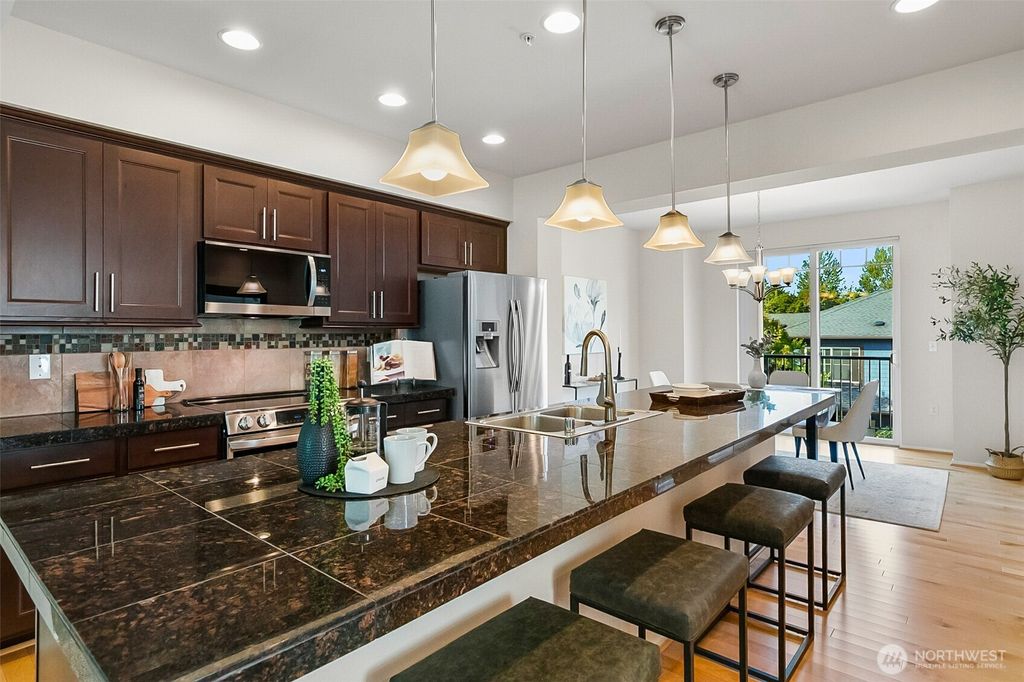 Photo of 10370 156th Place NE #102, Redmond, WA 98052 (MLS # 2428806)