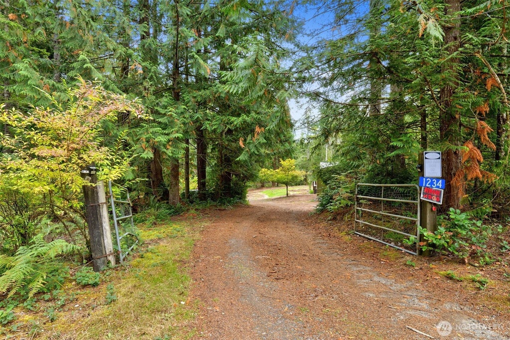 Photo of 1234 Morganmarsh SPUR W, Seabeck, WA 98380 (MLS # 2588540)