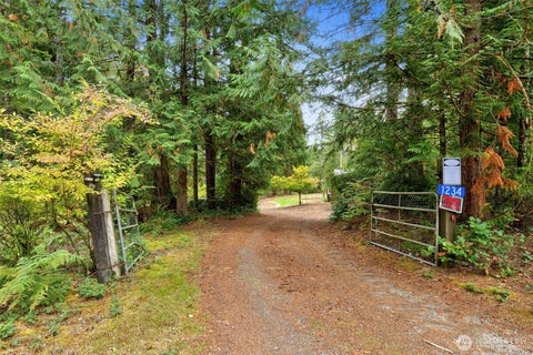 Photo of 1234 Morganmarsh Spur SPUR W, Seabeck, WA 98380 (MLS # 2588540)