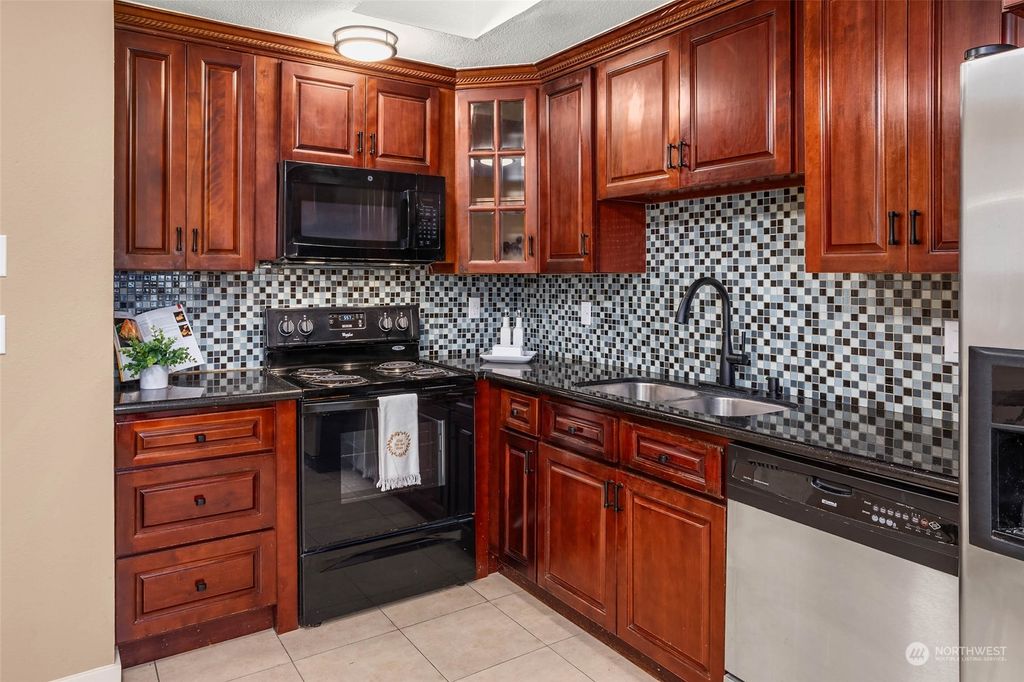 Photo of 4308 NE Sunset Boulevard #T1, Renton, WA 98059 (MLS # 2239227)