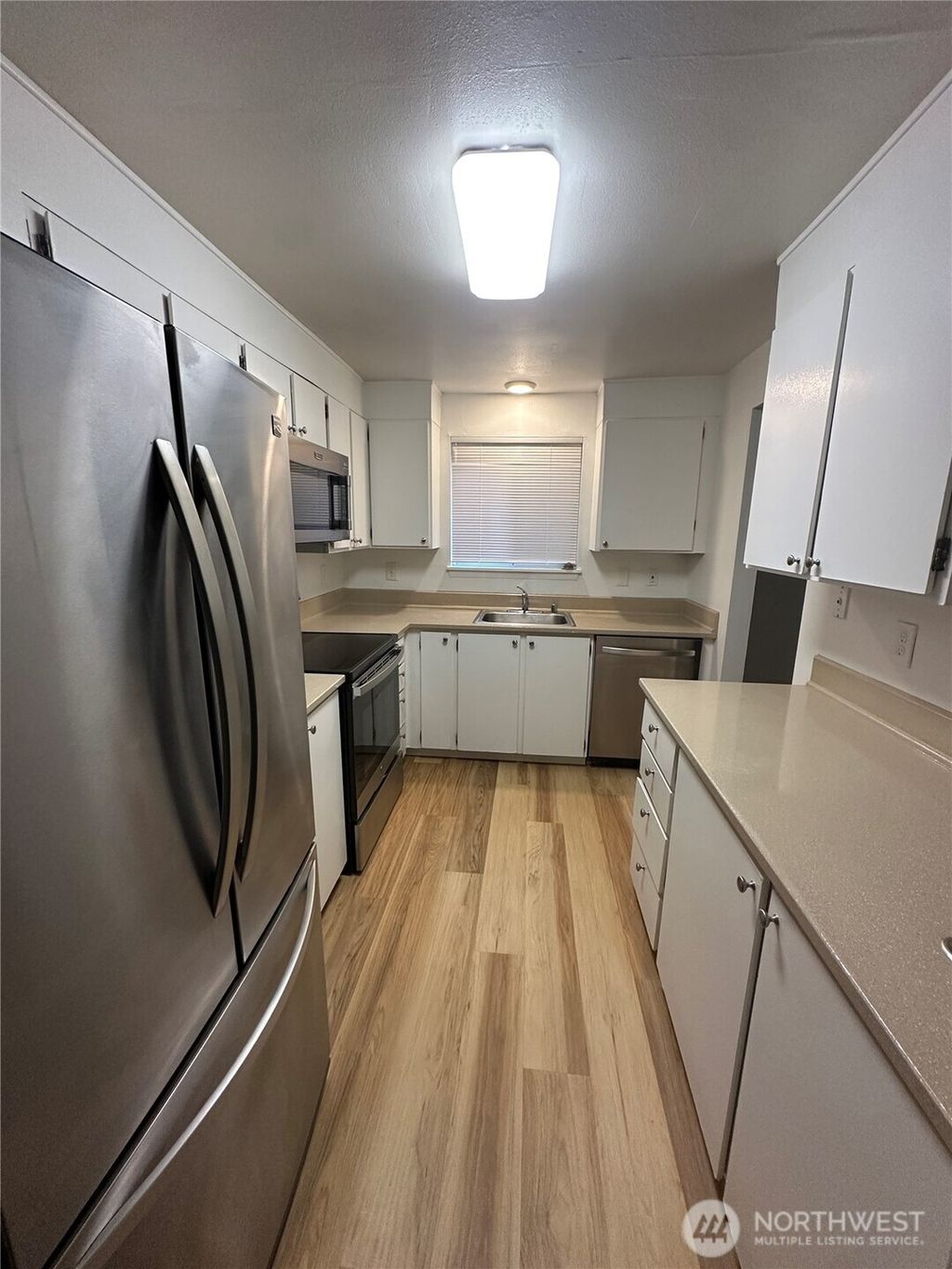 Photo of 14133 NE 7th Place #3, Bellevue, WA 98007 (MLS # 2475596)