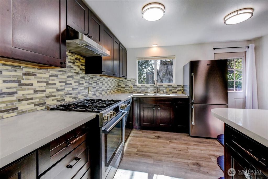 Photo of 11242 A Fremont Avenue N, Seattle, WA 98133 (MLS # 2488109)