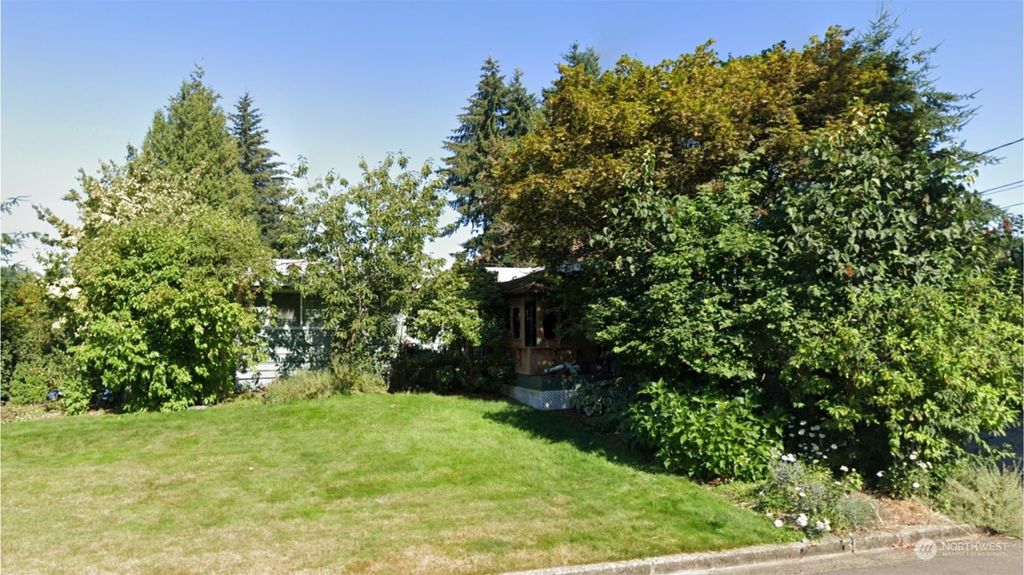 Photo of 418 111th Avenue SE, Bellevue, WA 98004 (MLS # 2265617)