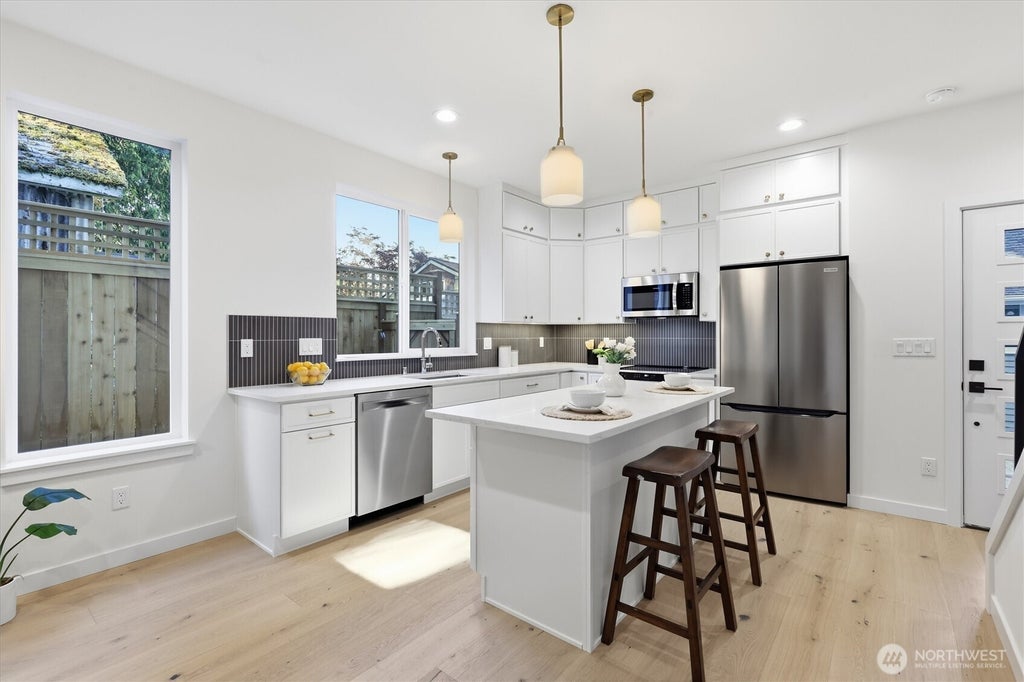 Photo of 13353 25th Avenue NE, Seattle, WA 98125 (MLS # 2550302)