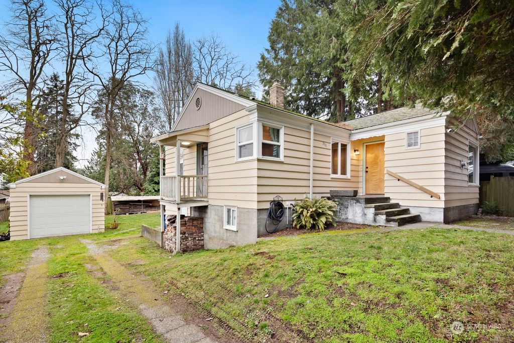 Photo of 3711 SW 112th Street, Seattle, WA 98146 (MLS # 2323029)