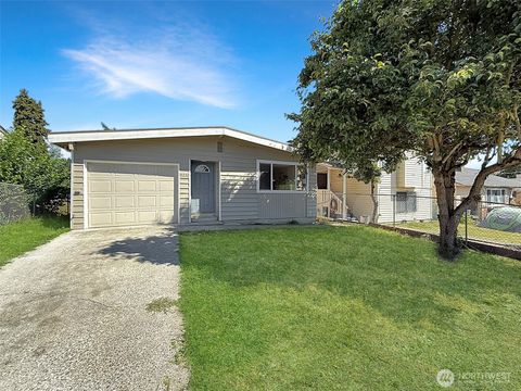 Photo of 9230 38th Avenue S, Seattle, WA 98118 (MLS # 2423851)