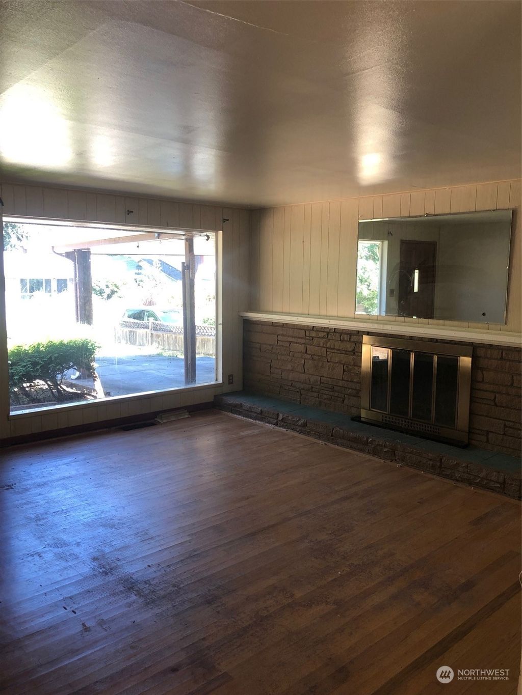 Photo of 821 NE 123rd Street, Seattle, WA 98125 (MLS # 2144851)