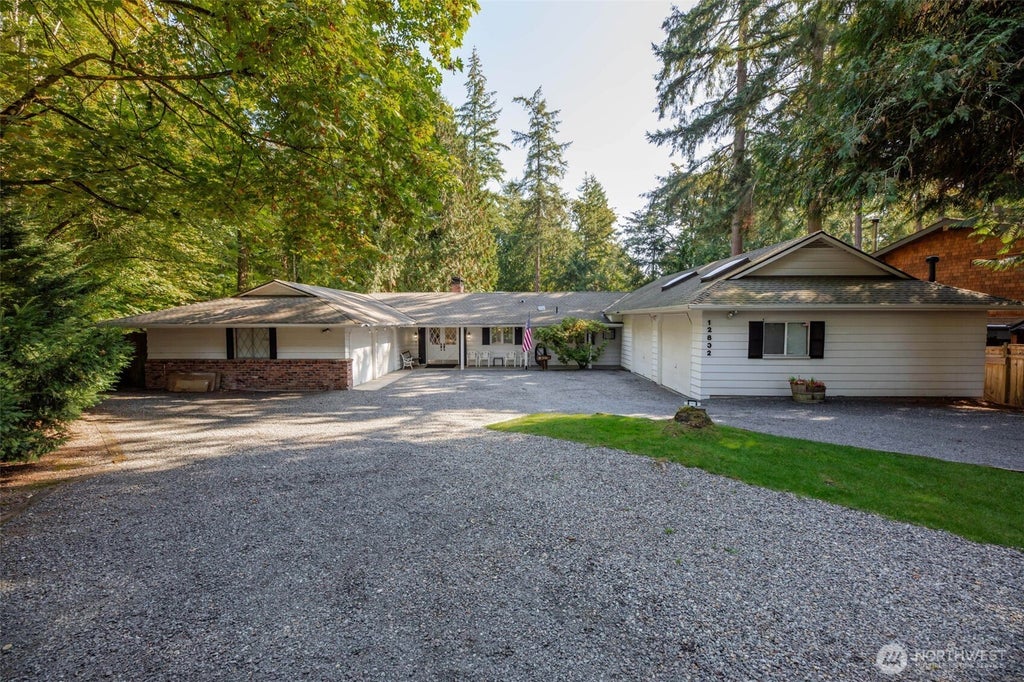 Photo of 12832 Holiday Drive NE, Kirkland, WA 98034 (MLS # 2585947)