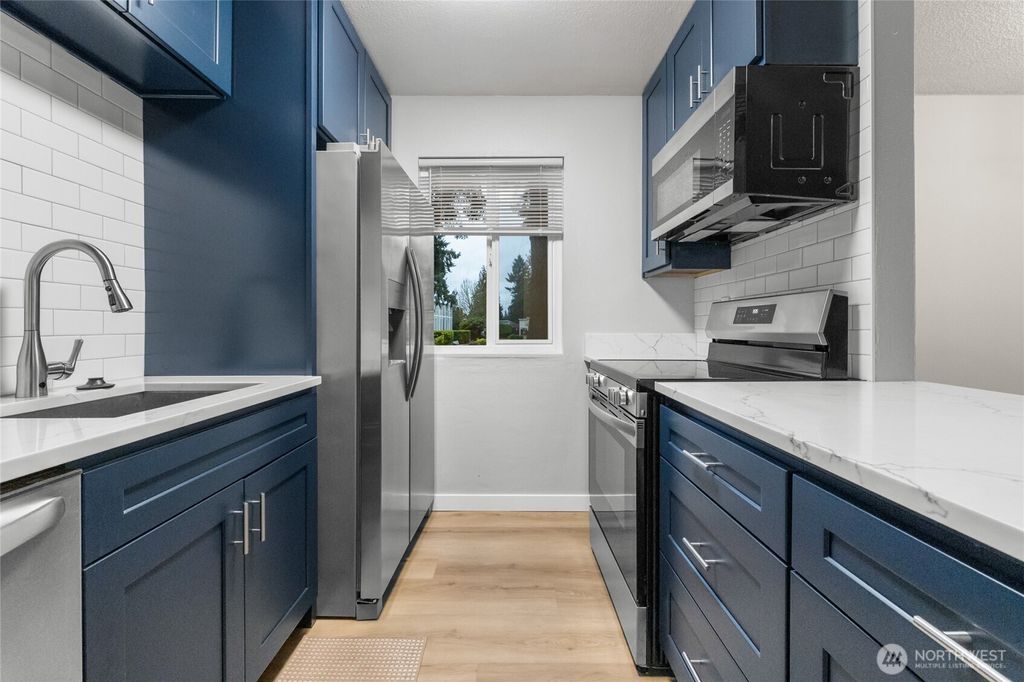 Photo of 12510 NE 130th Way #B106, Kirkland, WA 98034 (MLS # 2466320)