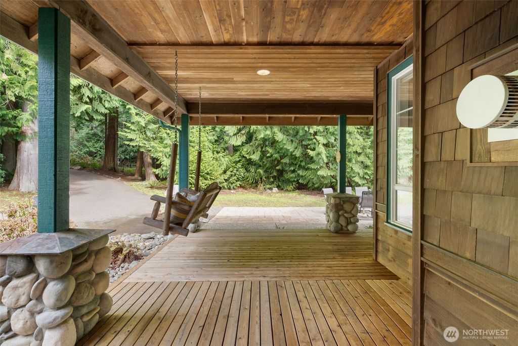 Photo of 7139 NE Dolphin Drive, Bainbridge Island, WA 98110 (MLS # 2490342)