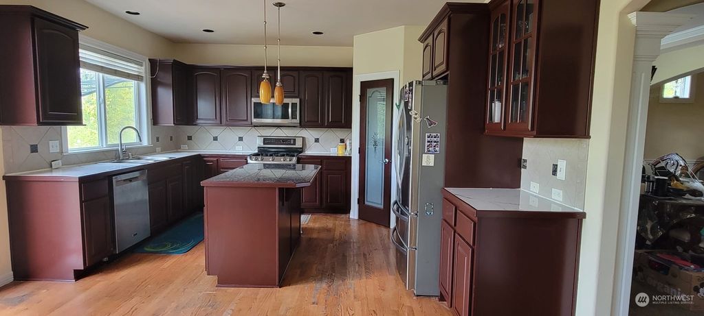 Photo of 5516 NE 13th Place, Renton, WA 98059 (MLS # 2229566)