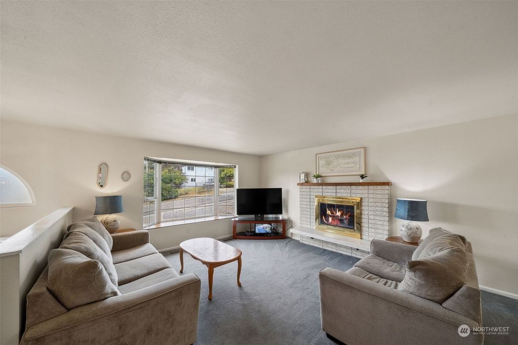 Photo of 1423 S 220th Street, Des Moines, WA 98198 (MLS # 2276869)