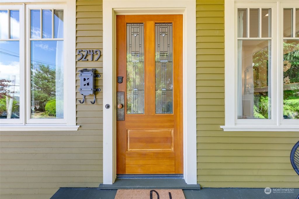 Photo of 5249 S Mayflower Street, Seattle, WA 98118 (MLS # 2255456)