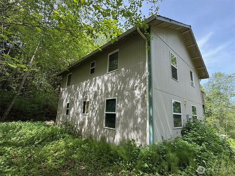 Photo of 7605 NE Hidden Cove Road, Bainbridge Island, WA 98110 (MLS # 2467539)